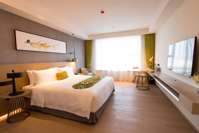 Imagen de la habitación del Hotel The Mulian Of Bantian Shenzhen. Foto 11