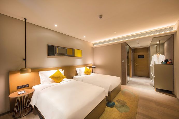 Imagen de la habitación del Hotel The Mulian Of Bantian Shenzhen. Foto 14