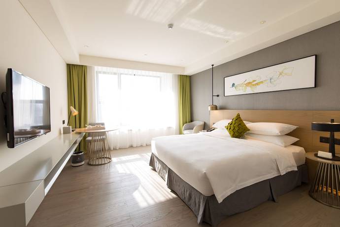 Imagen de la habitación del Hotel The Mulian Of Bantian Shenzhen. Foto 20