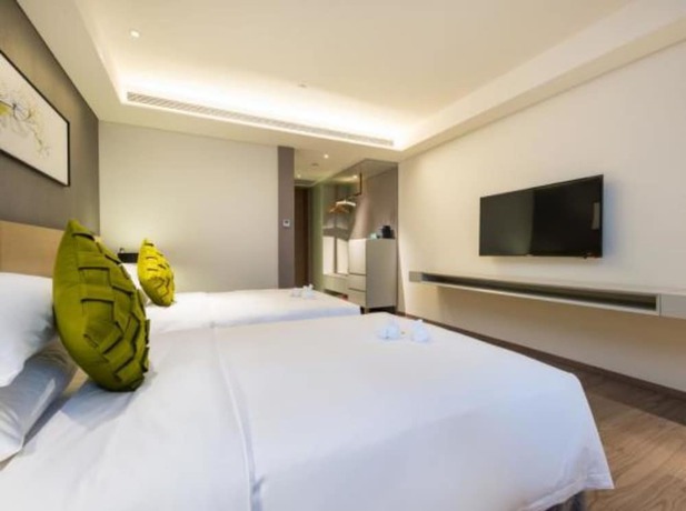 Imagen de la habitación del Hotel The Mulian Suzhou Branch. Foto 2