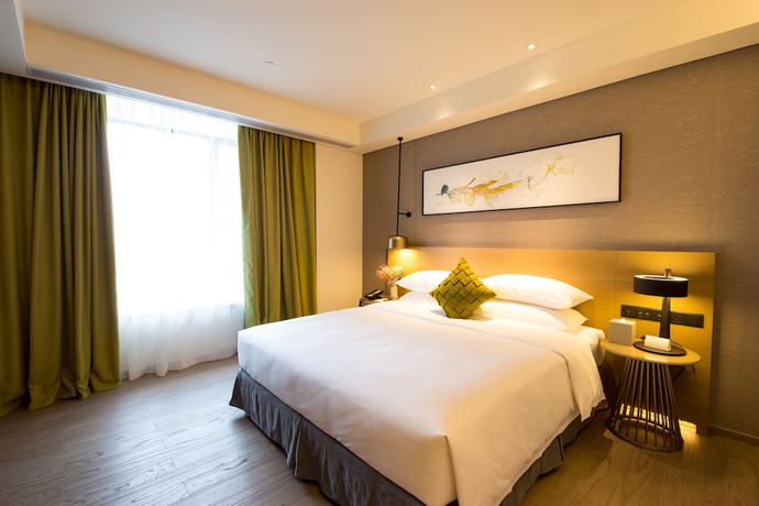 Imagen de la habitación del Hotel The Mulian Suzhou Branch. Foto 8