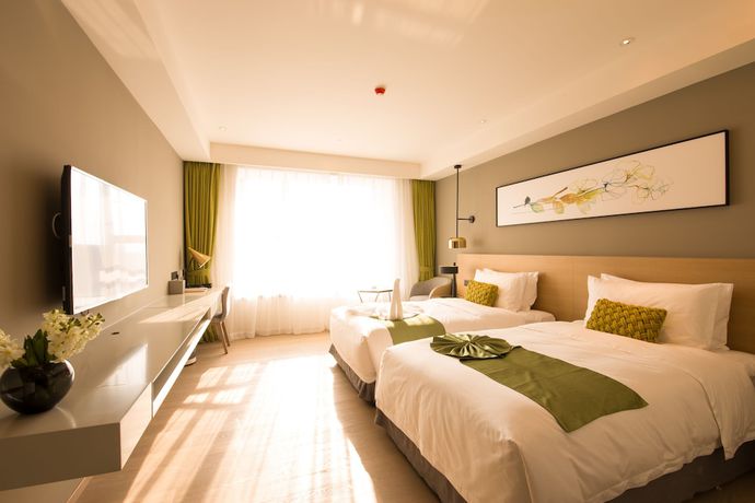 Imagen de la habitación del Hotel The Mulian Suzhou Branch. Foto 12