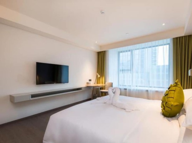 Imagen de la habitación del Hotel The Mulian Suzhou Branch. Foto 14