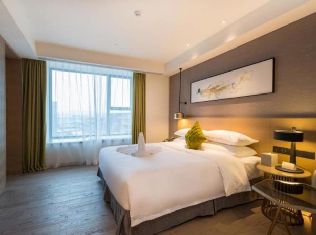 Imagen de la habitación del Hotel The Mulian Suzhou Branch. Foto 17