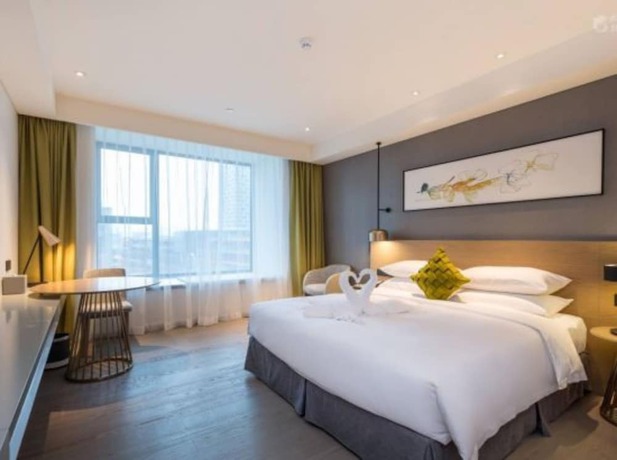 Imagen de la habitación del Hotel The Mulian Suzhou Branch. Foto 18