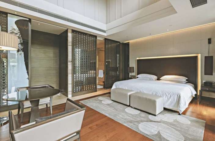 Imagen de la habitación del Hotel The Mulian Urban Resort Hotels Huadu. Foto 4
