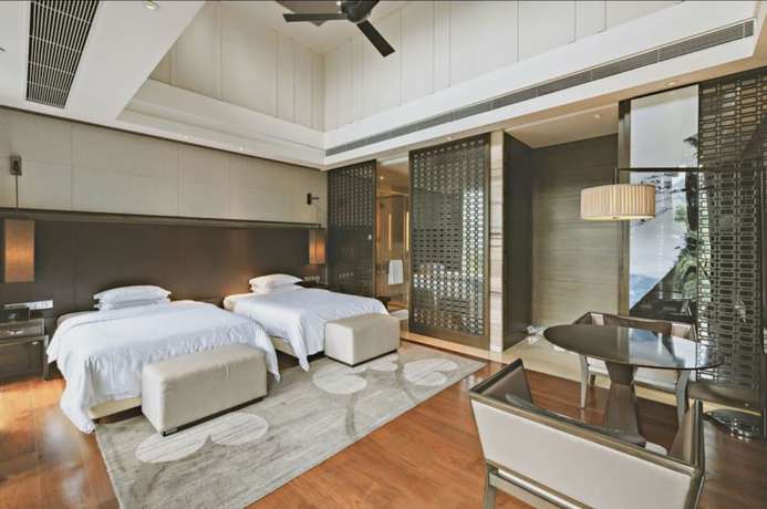Imagen de la habitación del Hotel The Mulian Urban Resort Hotels Huadu. Foto 7