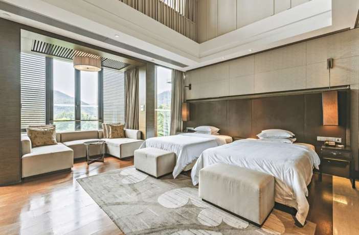 Imagen de la habitación del Hotel The Mulian Urban Resort Hotels Huadu. Foto 8