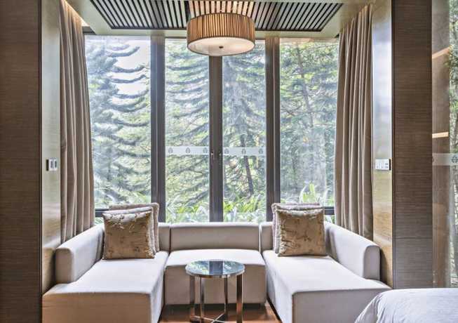 Imagen de la habitación del Hotel The Mulian Urban Resort Hotels Huadu. Foto 12