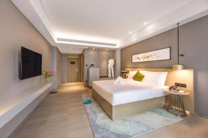 Imagen de la habitación del Hotel The Mulian Xian Wanxianghui Branch. Foto 4