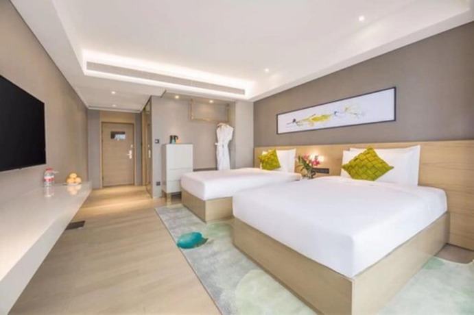 Imagen de la habitación del Hotel The Mulian Xian Wanxianghui Branch. Foto 5