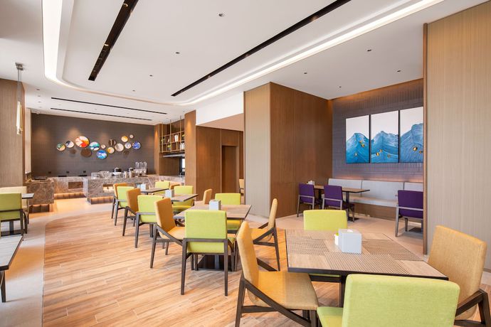 Imagen del bar/restaurante del Hotel The Mulian Xian Wanxianghui Branch. Foto 3