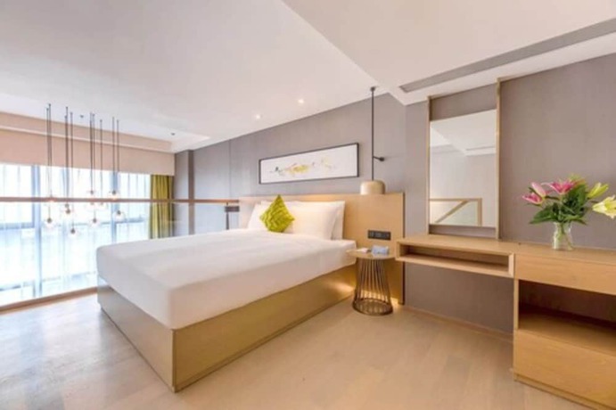 Imagen de la habitación del Hotel The Mulian Xian Wanxianghui Branch. Foto 11
