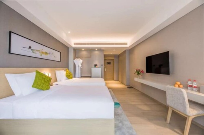 Imagen de la habitación del Hotel The Mulian Xian Wanxianghui Branch. Foto 12