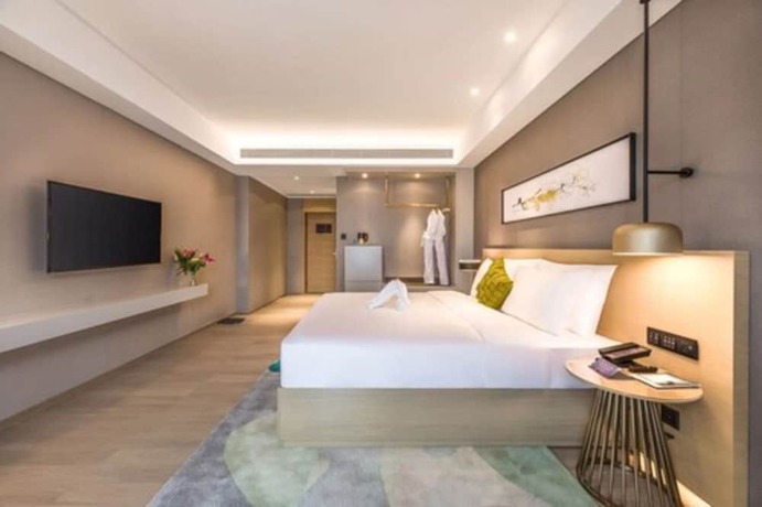 Imagen de la habitación del Hotel The Mulian Xian Wanxianghui Branch. Foto 15