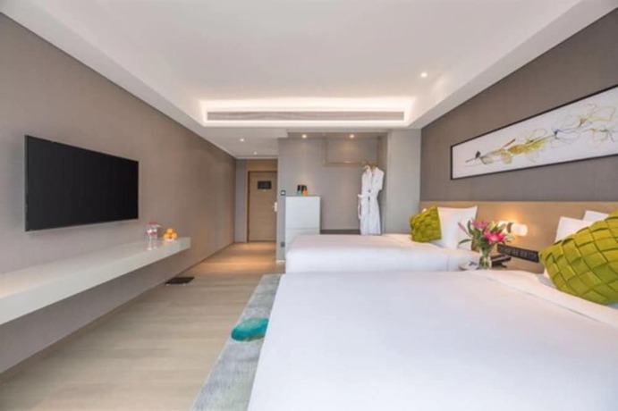 Imagen de la habitación del Hotel The Mulian Xian Wanxianghui Branch. Foto 16