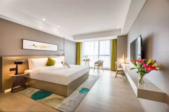 Imagen de la habitación del Hotel The Mulian Xian Wanxianghui Branch. Foto 17