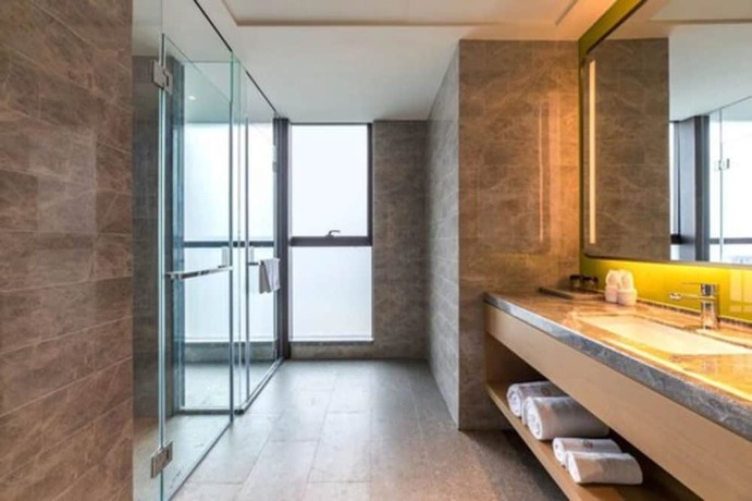 Imagen de la habitación del Hotel The Mulian Xian Wanxianghui Branch. Foto 18