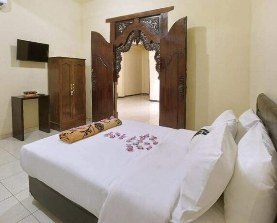 Imagen de la habitación del Hotel The Murai Guest House. Foto 18