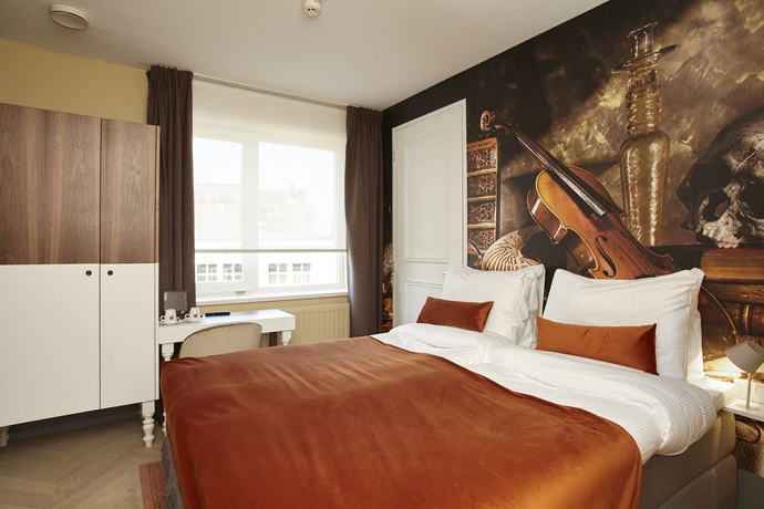 Imagen de la habitación del Hotel The Muse Amsterdam Boutique. Foto 7