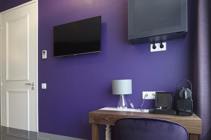 Imagen de la habitación del Hotel The Muse Amsterdam Boutique. Foto 8