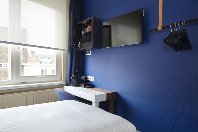 Imagen de la habitación del Hotel The Muse Amsterdam Boutique. Foto 11