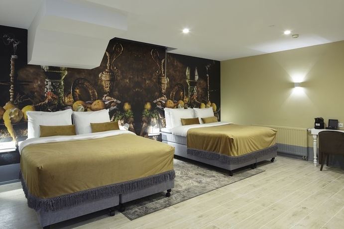 Imagen de la habitación del Hotel The Muse Amsterdam Boutique. Foto 12