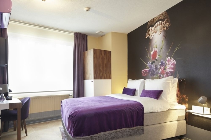 Imagen de la habitación del Hotel The Muse Amsterdam Boutique. Foto 13