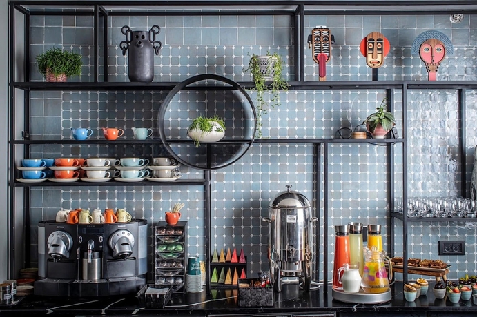 Imagen del bar/restaurante del Hotel The Muse Boutique Tel Aviv. Foto 4