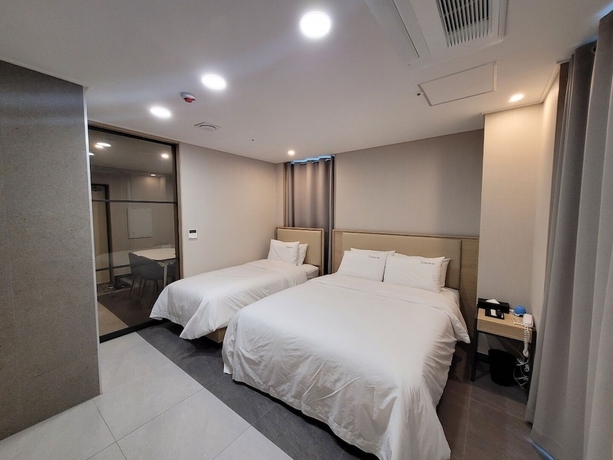 Imagen de la habitación del Hotel The Muse and Residence. Foto 2