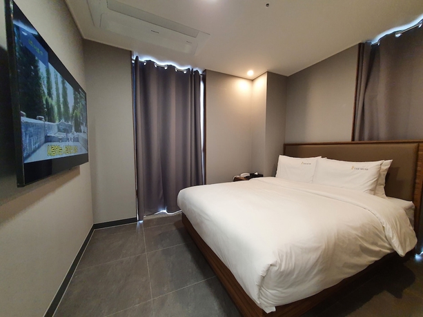 Imagen de la habitación del Hotel The Muse and Residence. Foto 10