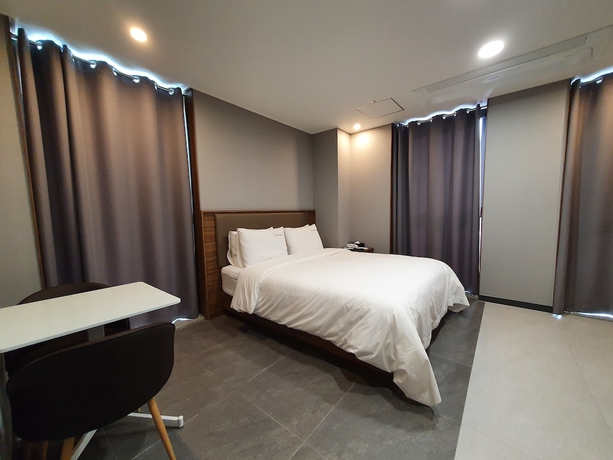 Imagen de la habitación del Hotel The Muse and Residence. Foto 13