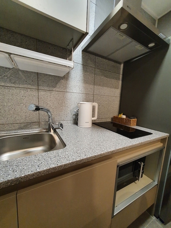 Imagen de la habitación del Hotel The Muse and Residence. Foto 16