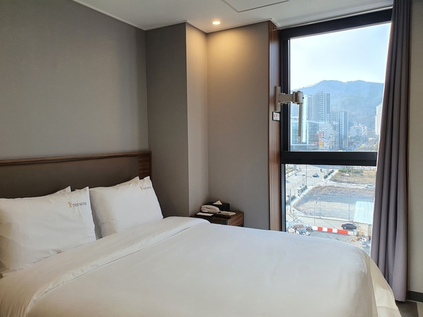 Imagen de la habitación del Hotel The Muse and Residence. Foto 19