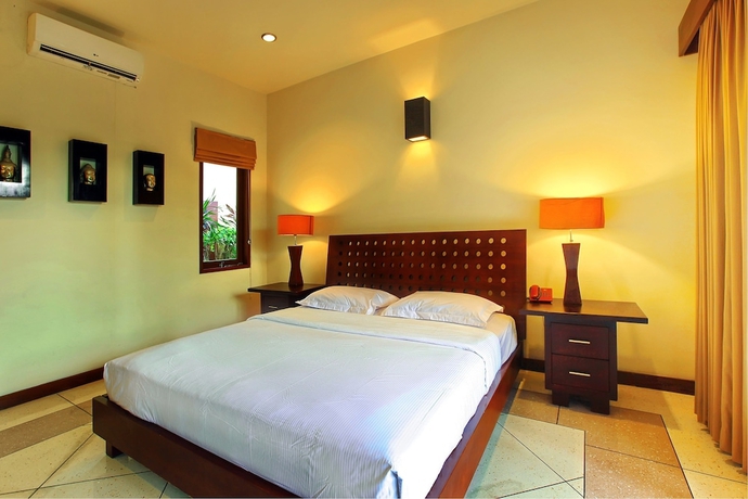 Imagen de la habitación del Hotel The Mutiara Jimbaran Boutique Villas. Foto 3