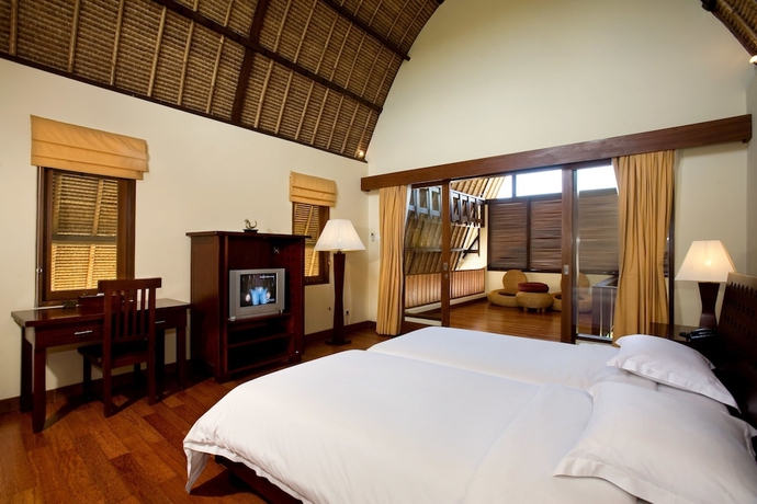 Imagen de la habitación del Hotel The Mutiara Jimbaran Boutique Villas. Foto 6