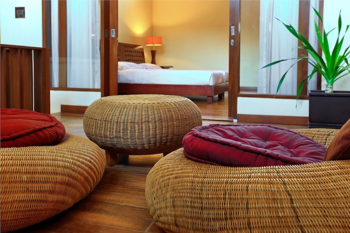 Imagen de la habitación del Hotel The Mutiara Jimbaran Boutique Villas. Foto 16