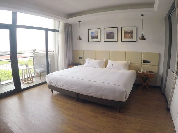 Imagen de la habitación del Hotel The Muyra Shanghai. Foto 9
