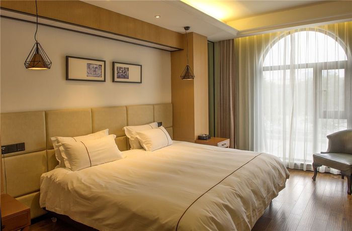 Imagen de la habitación del Hotel The Muyra Shanghai. Foto 10