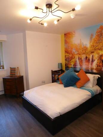 Imagen de la habitación del Hotel The Myriad. Foto 12