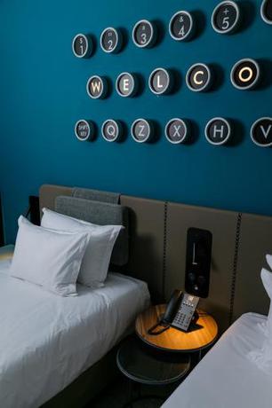 Imagen de la habitación del Hotel The NINE Lifestyle Experience. Foto 15