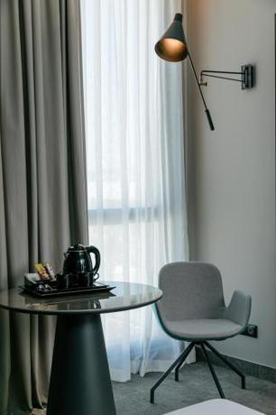 Imagen de la habitación del Hotel The NINE Lifestyle Experience. Foto 19