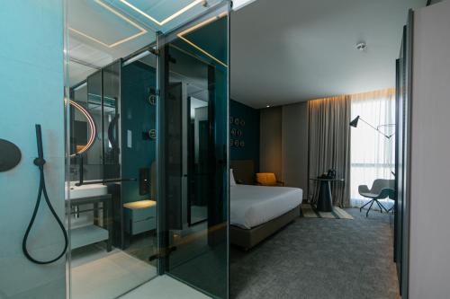 Imagen de la habitación del Hotel The NINE Lifestyle Experience. Foto 20