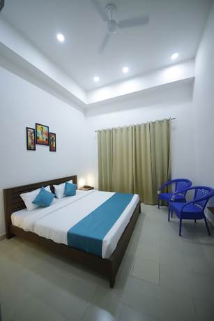 Imagen de la habitación del Hotel The Naga. Foto 5