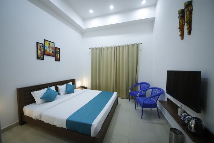Imagen de la habitación del Hotel The Naga. Foto 6