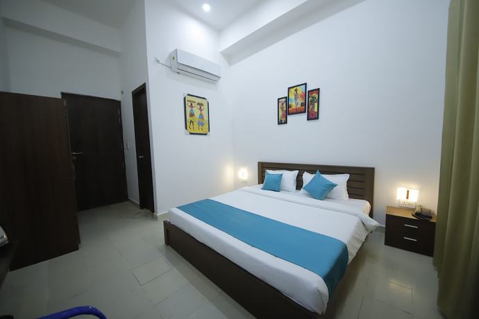 Imagen de la habitación del Hotel The Naga. Foto 7