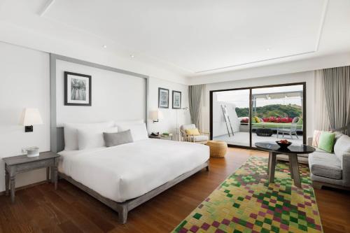 Imagen de la habitación del Hotel The Nai Harn. Foto 7