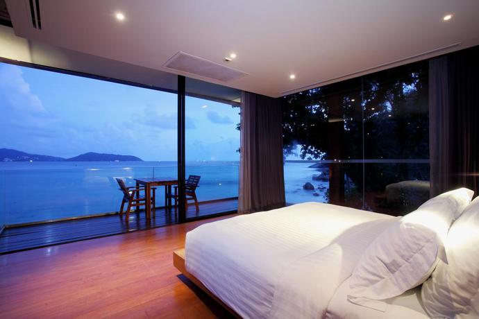 Imagen de la habitación del Hotel The Naka Phuket. Foto 2