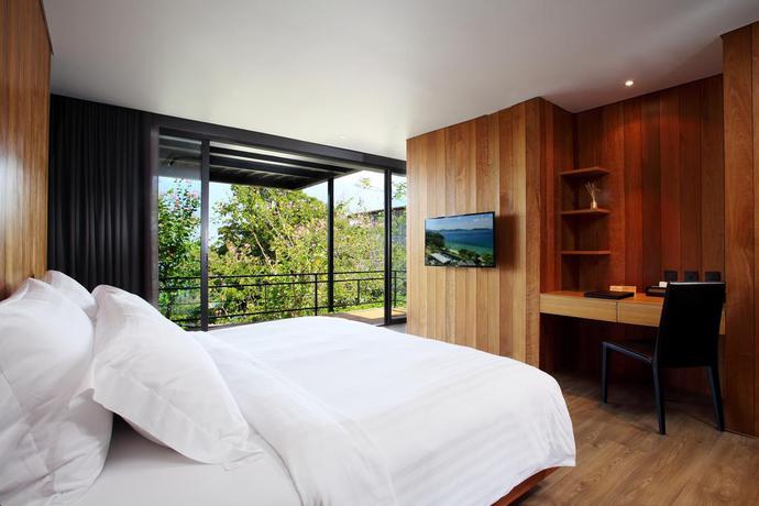 Imagen de la habitación del Hotel The Naka Phuket. Foto 3