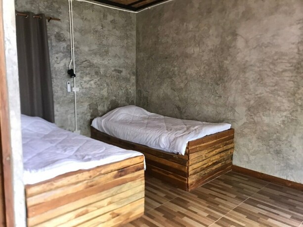 Imagen de la habitación del Hotel The Nanda Resort. Foto 26